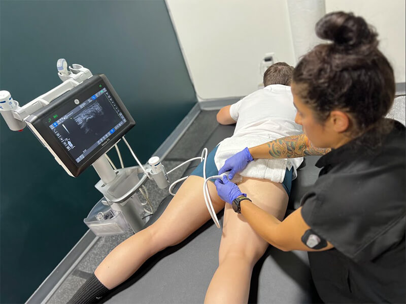 Diagnostic Ultrasound evaluating for hamstring tendon injury in active adult.