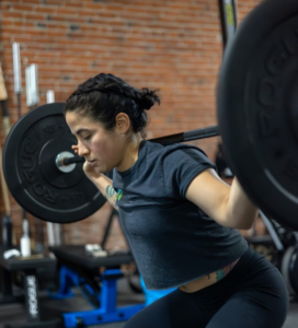 Woman lifting barbells